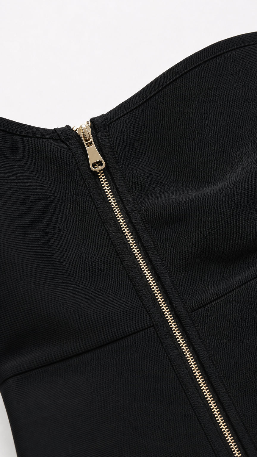 Close-up of back zipper detail on black formal dress