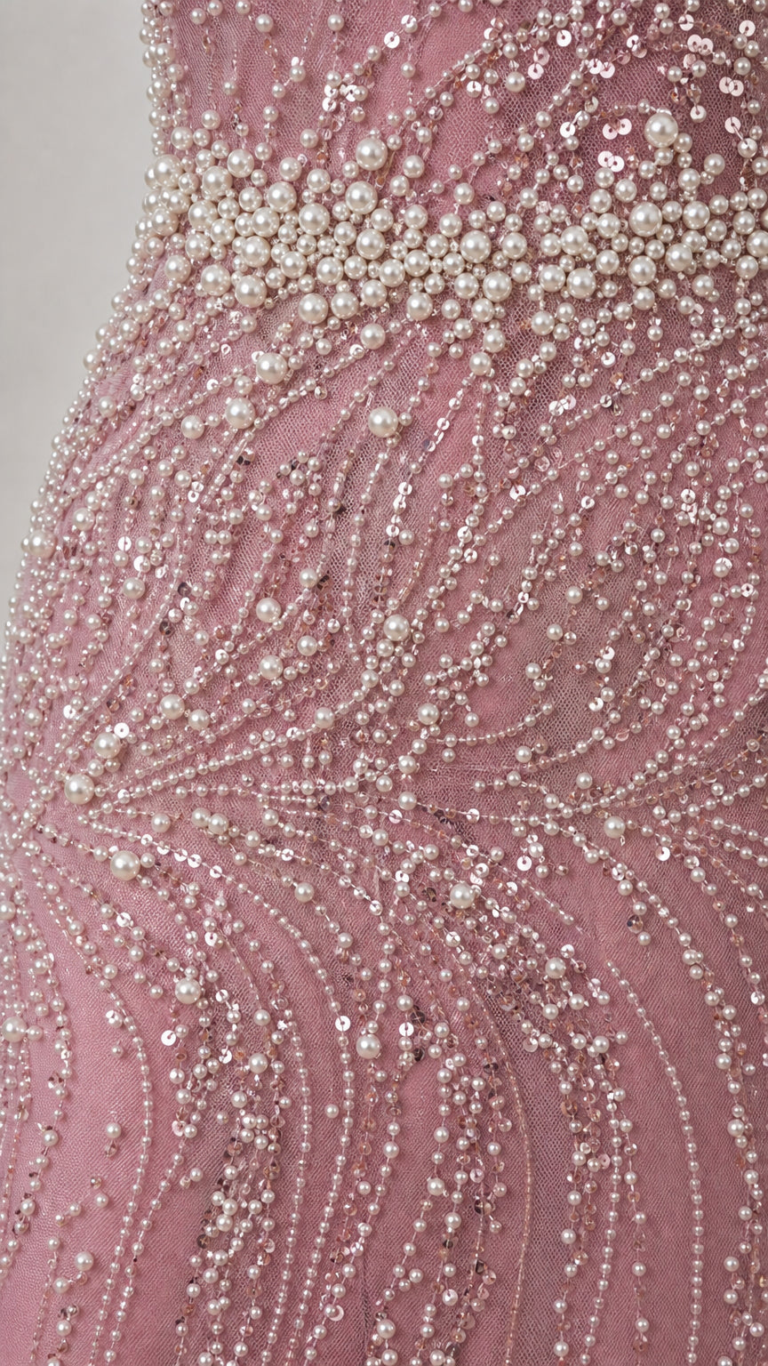 Close-up detail of pearl and sequin embellishments