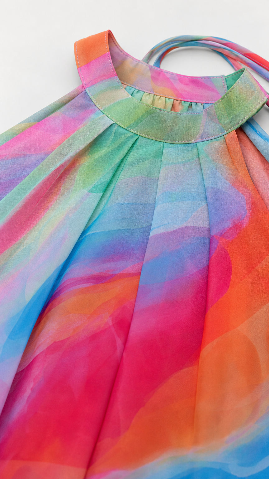 Close up of halter neckline and fabric print details