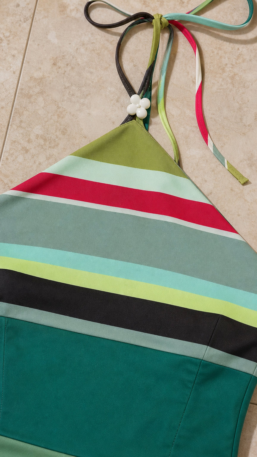 Close-up of halter neck straps and stripe detail