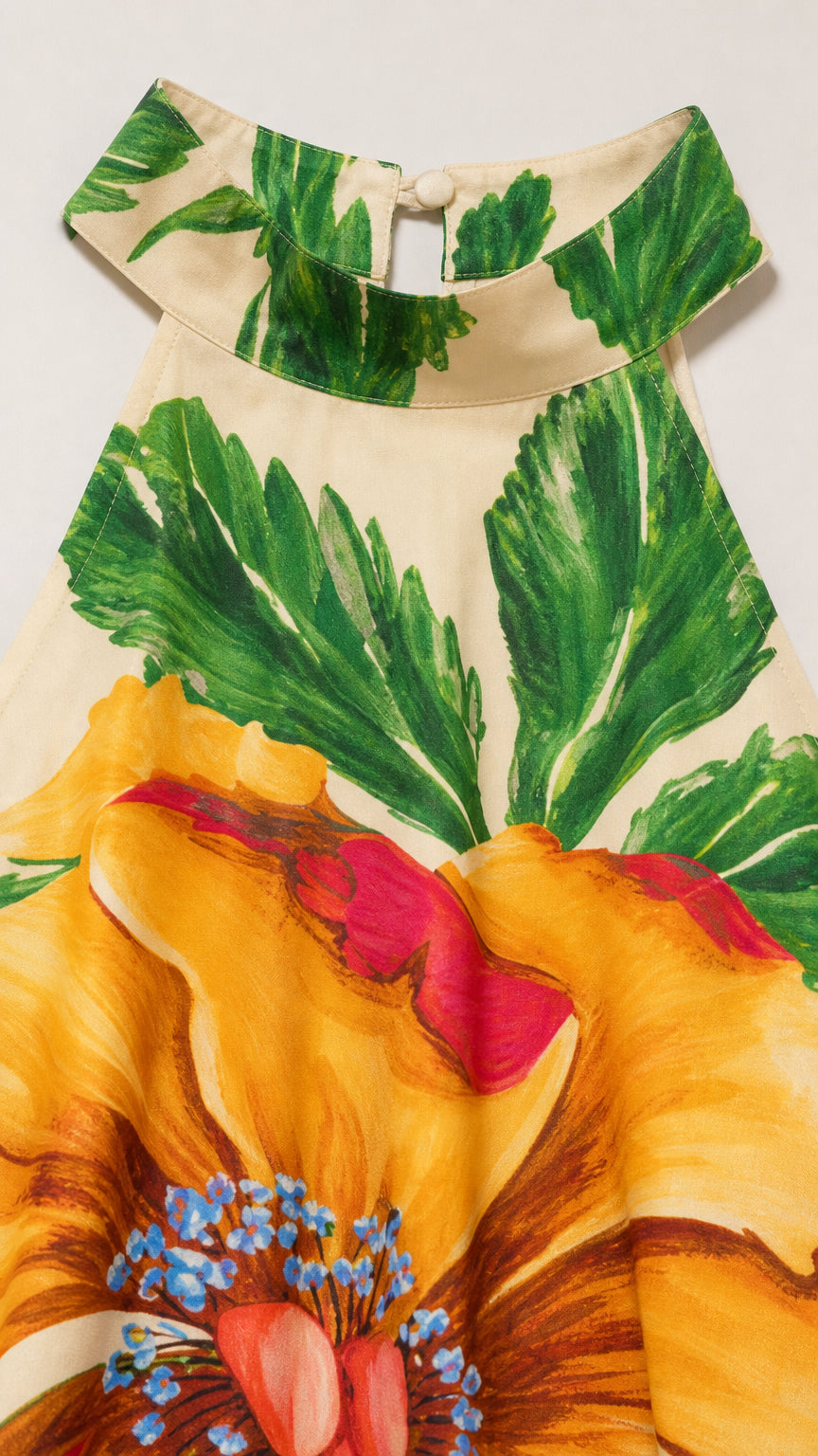 Close-up detail of floral print and halter neckline