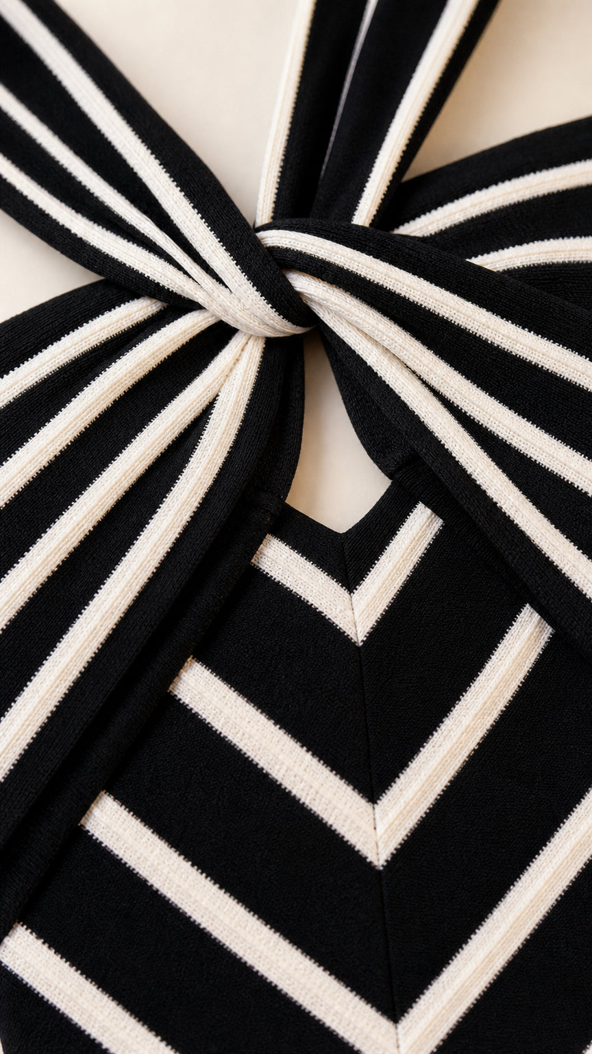 Close-up detail of the front twist knot halter neckline