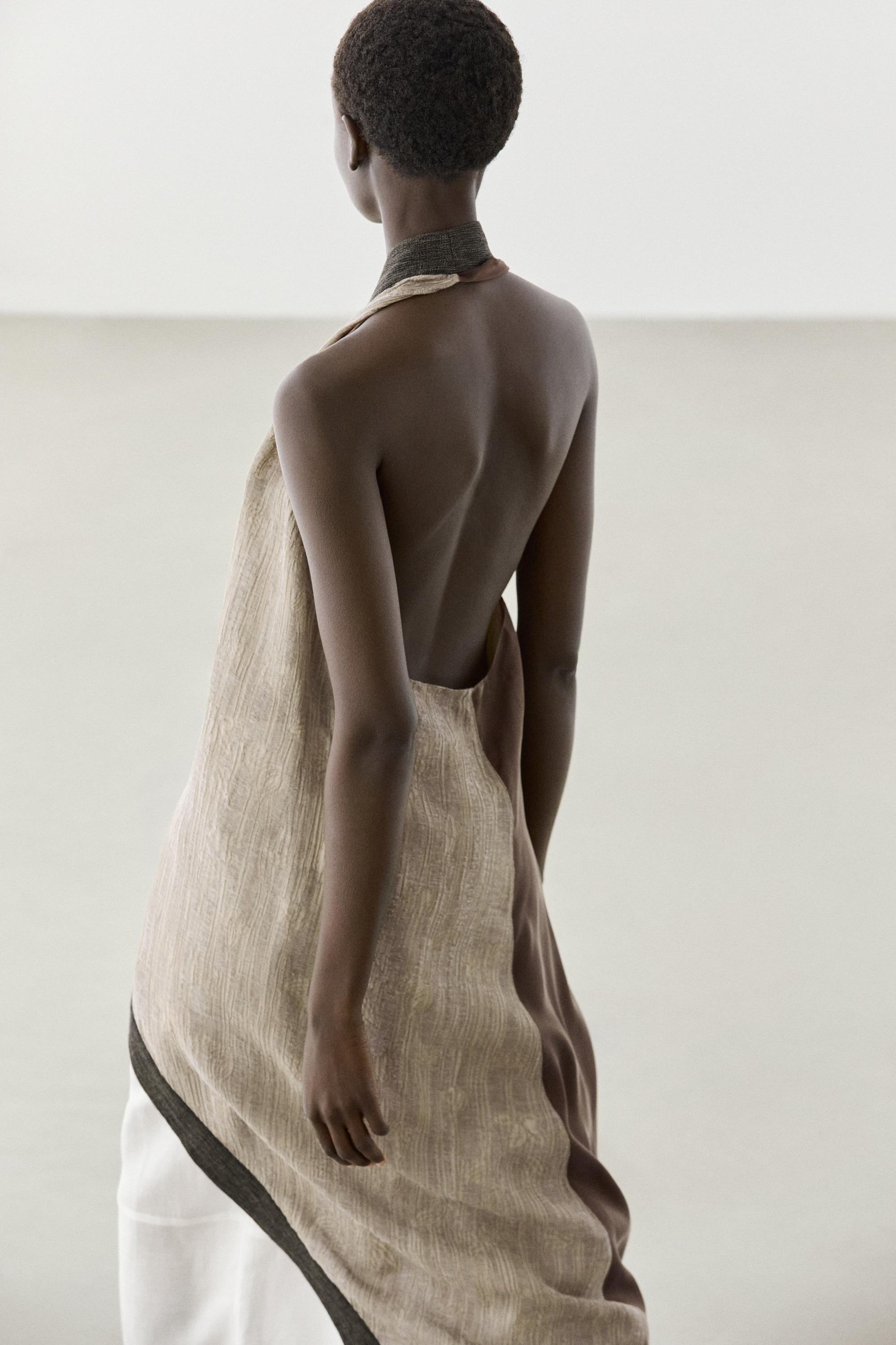 Flowing wrap top with mixed